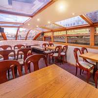 Салон Теплохода Олимпия вид на носовую часть.