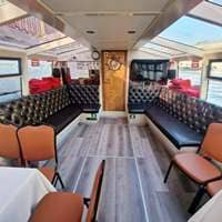 Черный диван на теплоходе Сардиния